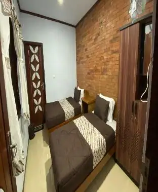 Homestay Candi Pawon Murtakim Syariah - Twin Room — foto 5