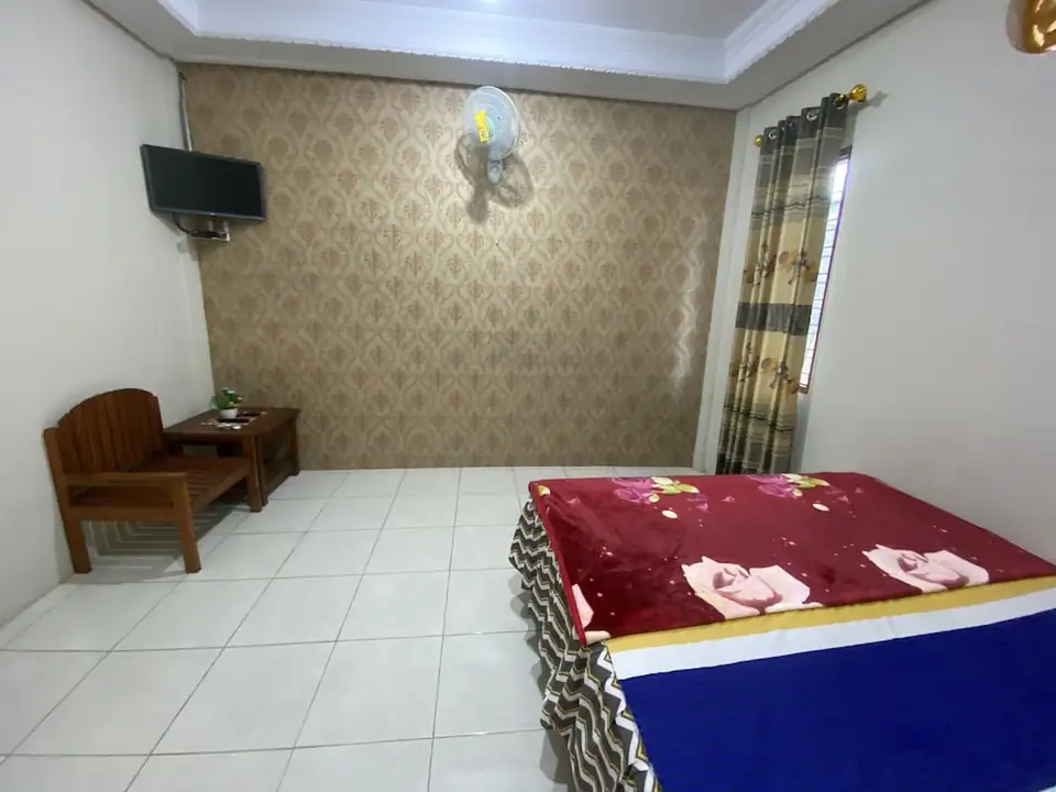 Homestay Sutrisno - Deluxe Double Room — foto 5