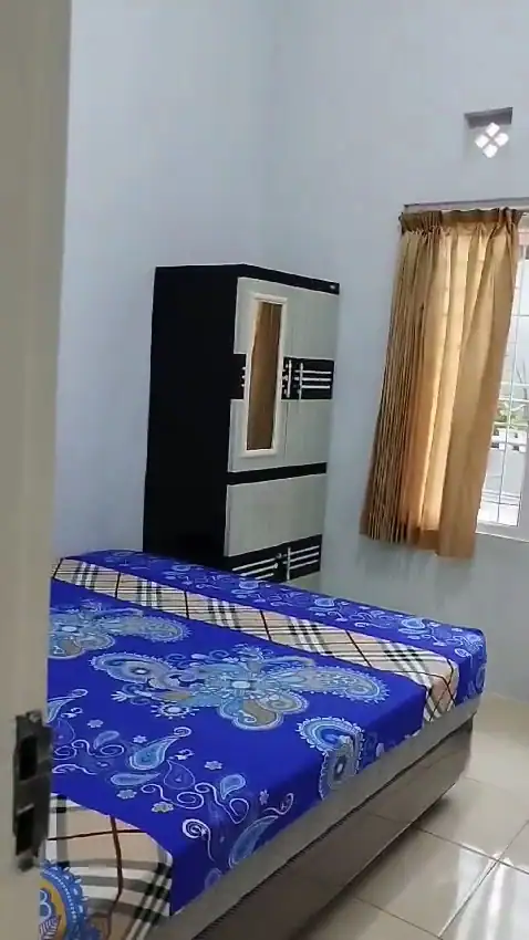 Kost Ibu Uut